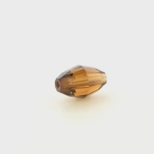 5200 - 9x6mm Swarovski Crystal Oval Bead - Smoked Topaz 5200 - 9x6mm Swarovski Crystal Oval Bead - Smoked Topaz