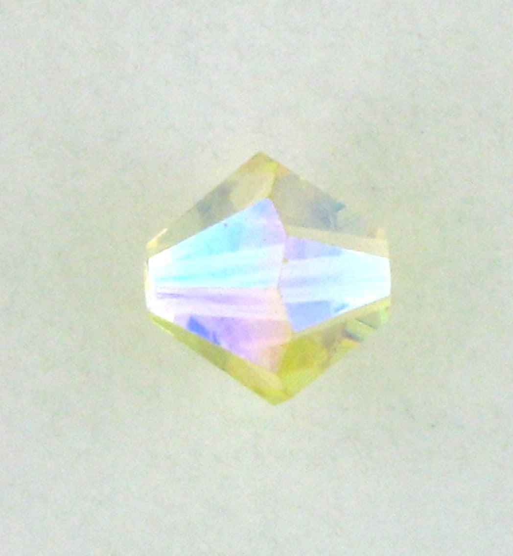 5301/5328 - 4mm Swarovski Bicone Bead - Jonquil AB2X 5301/5328 - 4mm Swarovski Bicone Bead - Jonquil AB2X