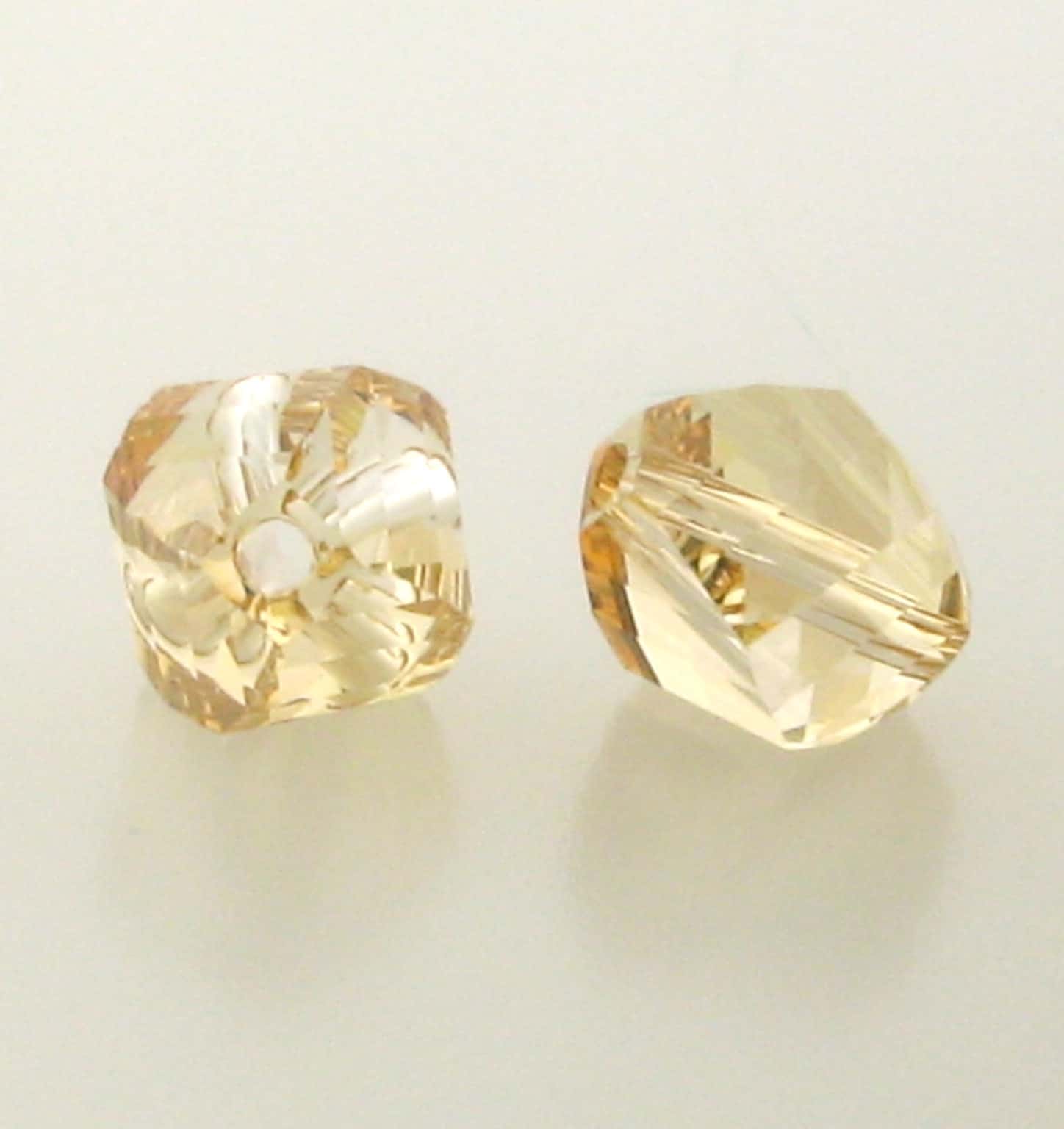 5020 - 8mm Swarovski Helix Beads - Golden Shadow 5020 - 8mm Swarovski Helix Beads - Golden Shadow