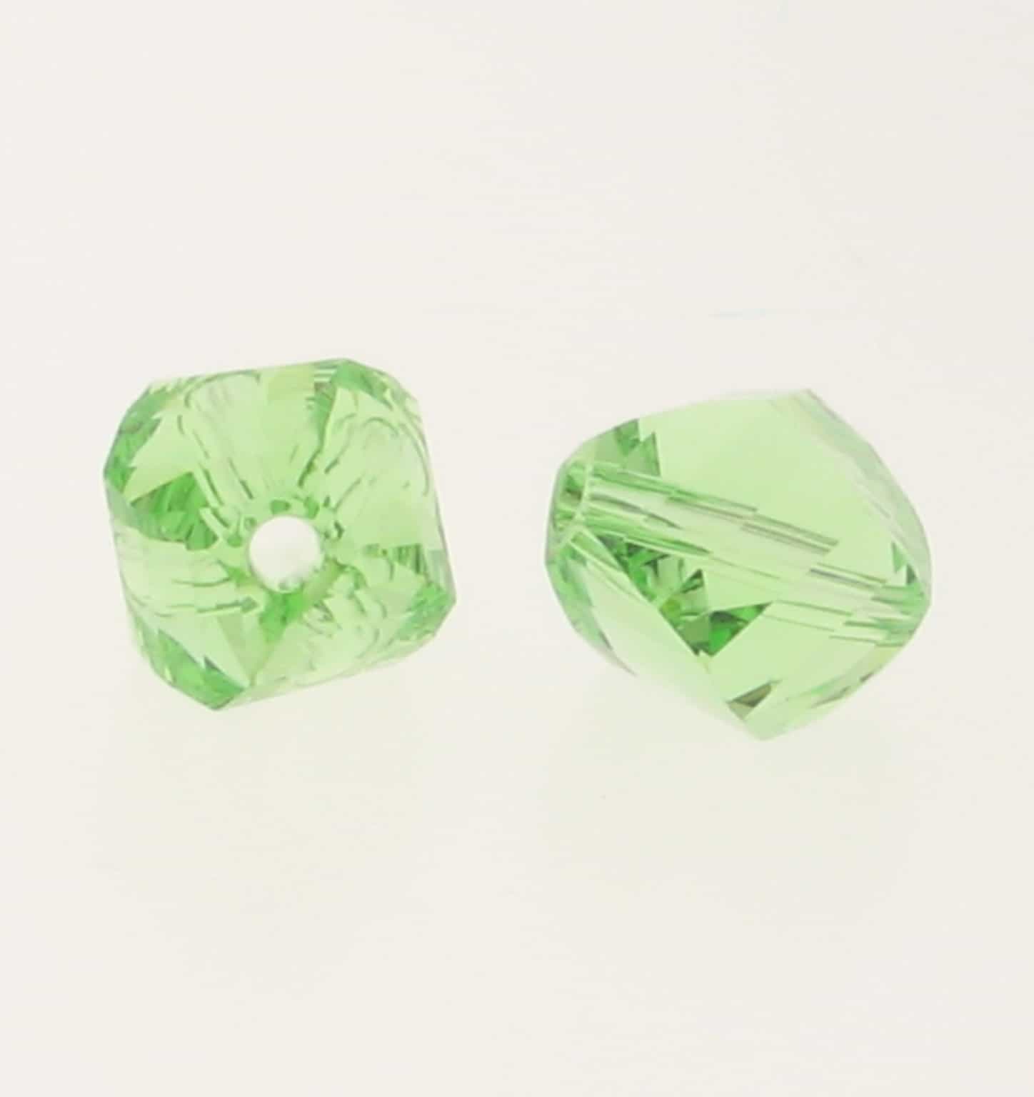 5020 - 10mm Swarovski Helix Beads - Peridot 5020 - 10mm Swarovski Helix Beads - Peridot