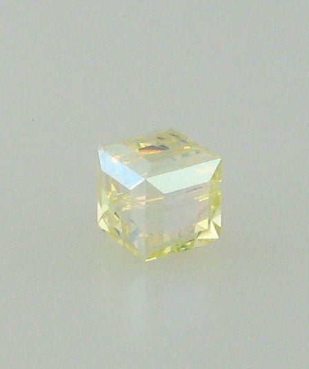 5601 - 4mm Swarovski Cube Crystal - Jonquil AB 5601 - 4mm Swarovski Cube Crystal - Jonquil AB