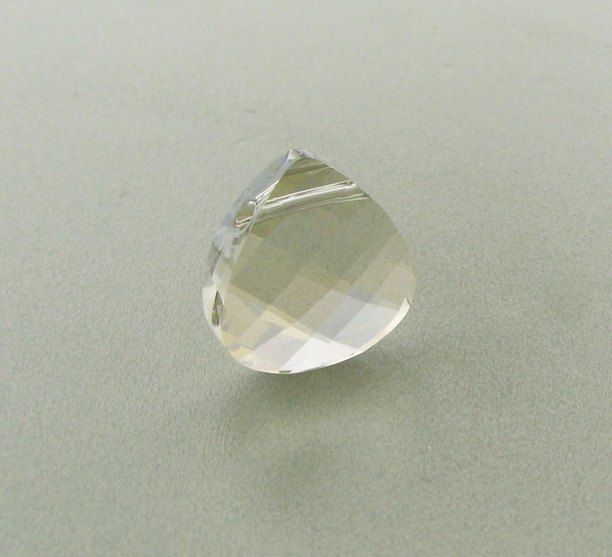 6012 - 11x10mm Swarovski Flat Briolette Pendant - Silver Shade 6012 - 11x10mm Swarovski Flat Briolette Pendant - Silver Shade