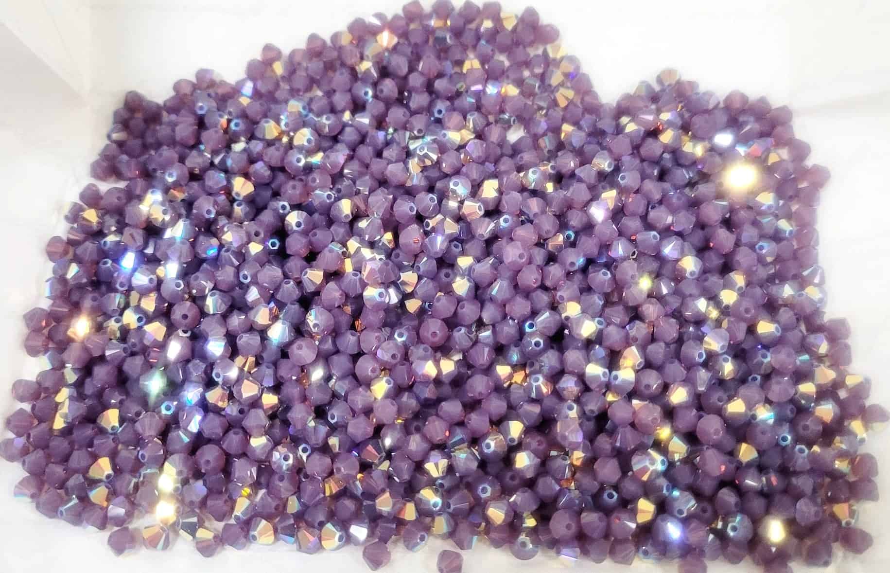 5301/5328 - 4mm Swarovski Bicone Bead - Cyclamen Opal AB 5301/5328 - 4mm Swarovski Bicone Bead - Cyclamen Opal AB